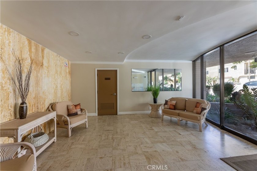 Welcome to this beautifully remodeled condominium in the highly - photo 5