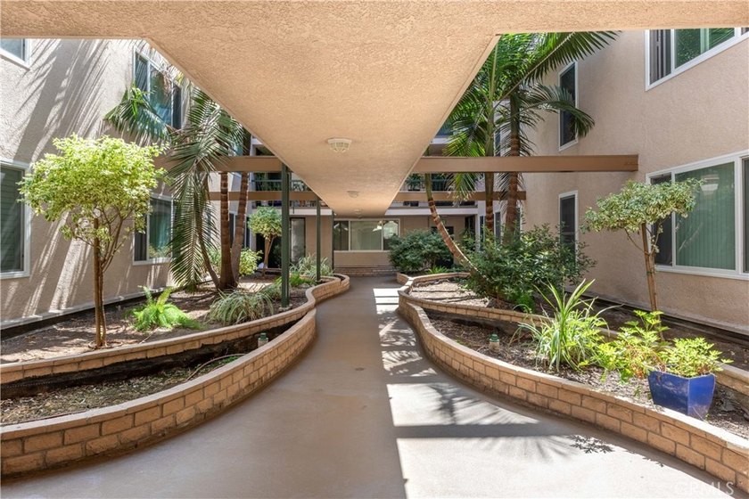 Welcome to this beautifully remodeled condominium in the highly - photo 6