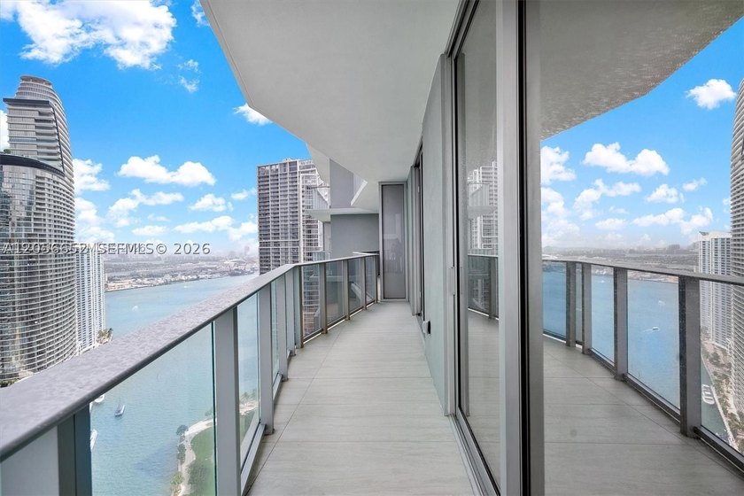 Wake up above the city with sweeping Biscayne Bay views from - photo 2
