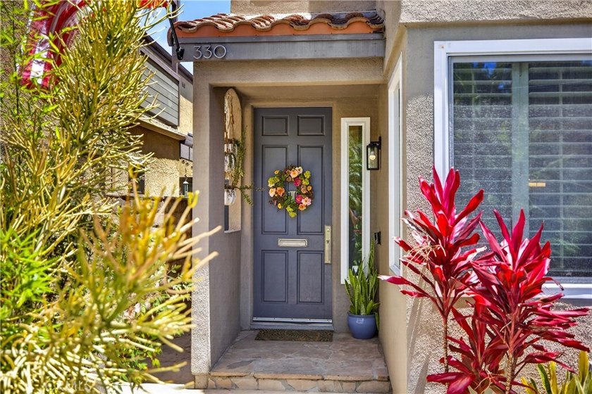 Nestled on a quiet cul-de-sac in highly desirable Alamitos - photo 4