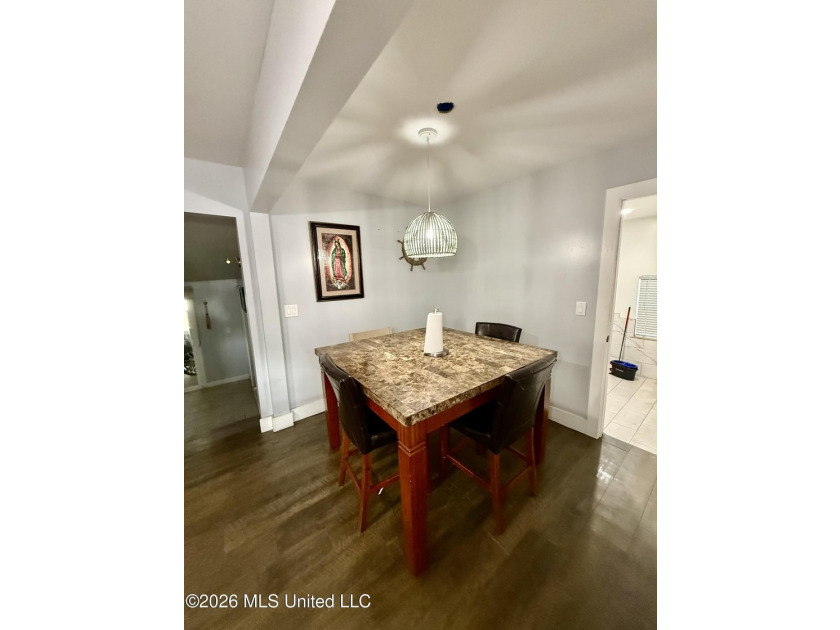 Welcome to Eastlawn! This updated 3-bedroom, 2-bath home sits on - photo 7