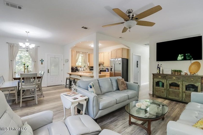 Nestled in a highly desirable golf cart community, this spacious - photo 5