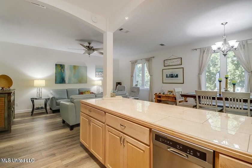 Nestled in a highly desirable golf cart community, this spacious - photo 10