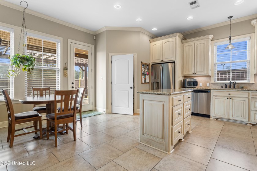 This immaculately maintained 3-bedroom, 2.5-bath home is nestled - photo 12