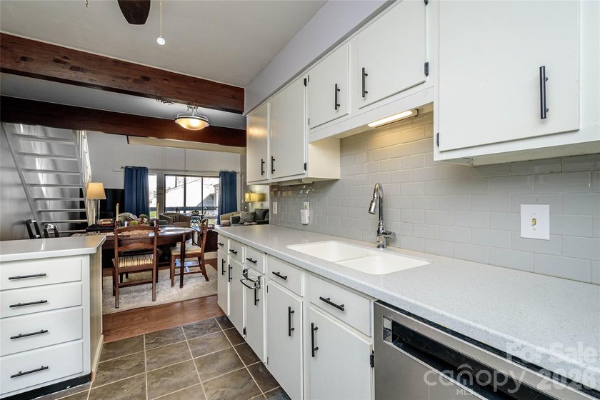 Great Location for this upper-floor end unit. Across the street - photo 13