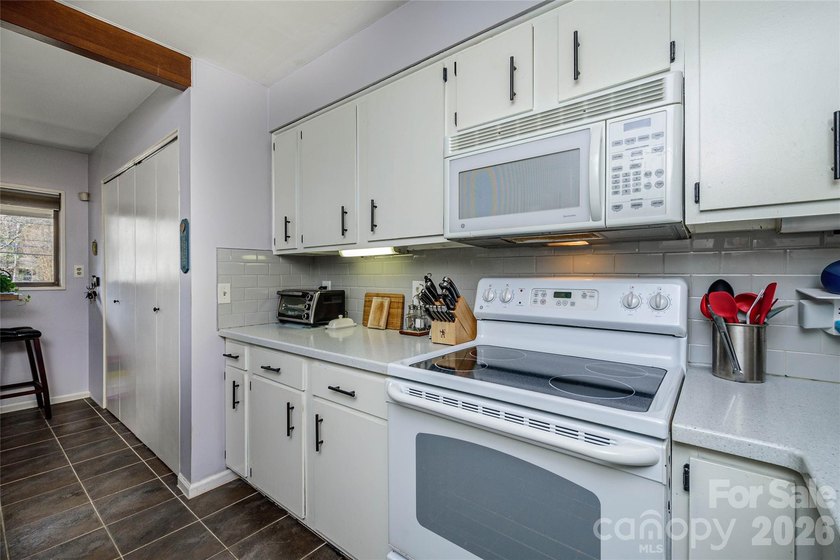 Great Location for this upper-floor end unit. Across the street - photo 15