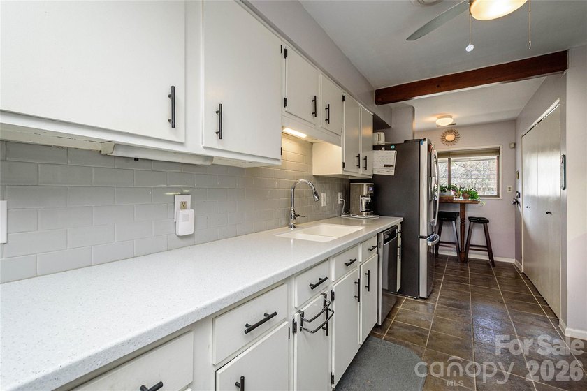 Great Location for this upper-floor end unit. Across the street - photo 16