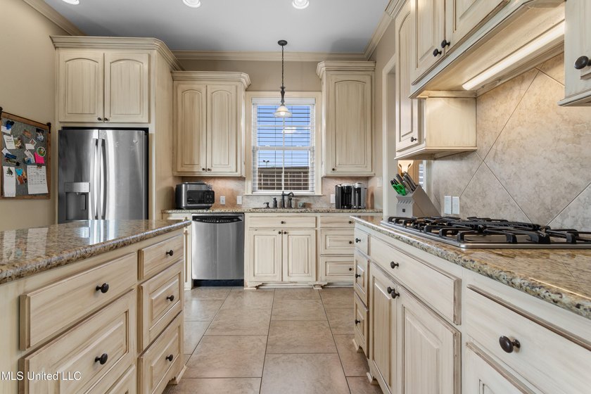 This immaculately maintained 3-bedroom, 2.5-bath home is nestled - photo 16