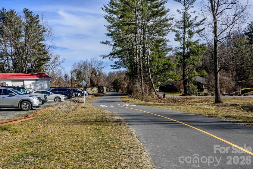 Great Location for this upper-floor end unit. Across the street - photo 46