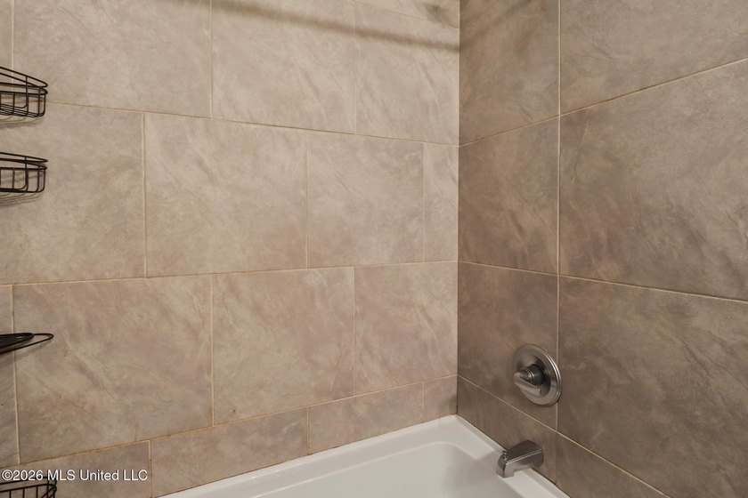 Welcome home! This updated 3-bedroom, 2-bathroom sits in a quiet - photo 14