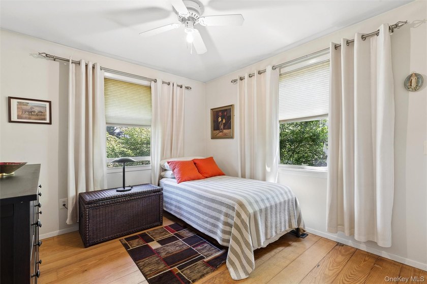 Nestled on a landscaped corner property in the heart of - photo 10