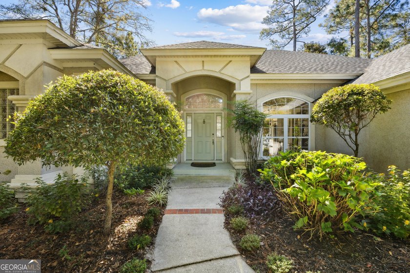 THIS BEAUTIFULLY UPDATED THREE-BEDROOM HOME IN OSPREY COVE IS - photo 7