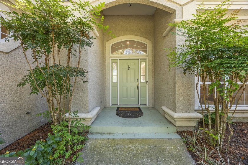 THIS BEAUTIFULLY UPDATED THREE-BEDROOM HOME IN OSPREY COVE IS - photo 8