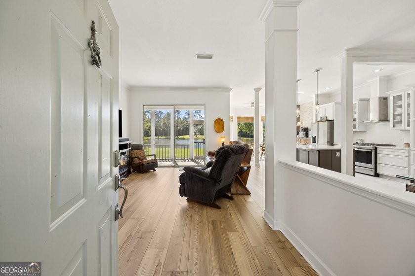 THIS BEAUTIFULLY UPDATED THREE-BEDROOM HOME IN OSPREY COVE IS - photo 9