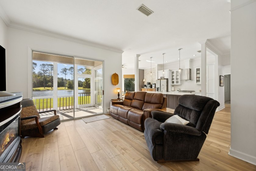 THIS BEAUTIFULLY UPDATED THREE-BEDROOM HOME IN OSPREY COVE IS - photo 10