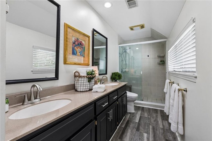 Beautiful 1.5 story home with rare attached 2 car garage in this - photo 19