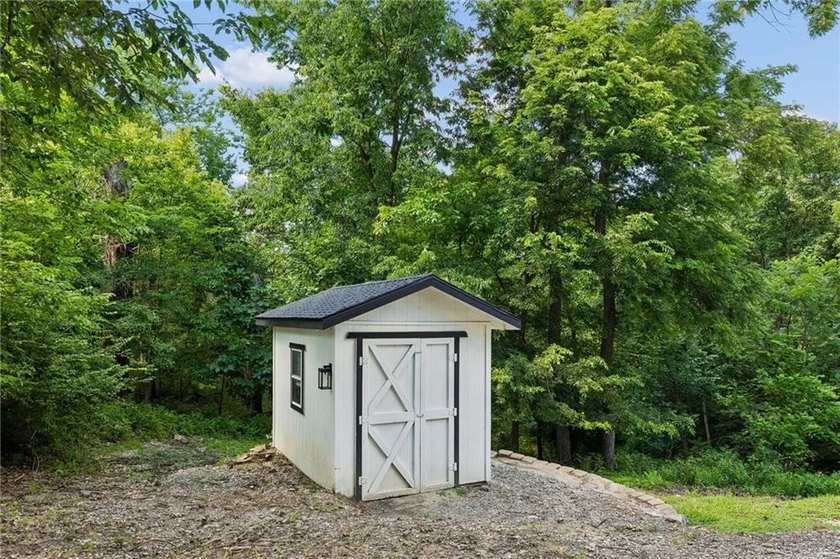 Beautiful 1.5 story home with rare attached 2 car garage in this - photo 40