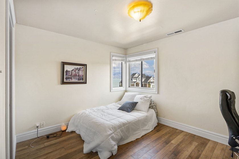 Wake up to sweeping lake and mountain views in this exceptional - photo 27