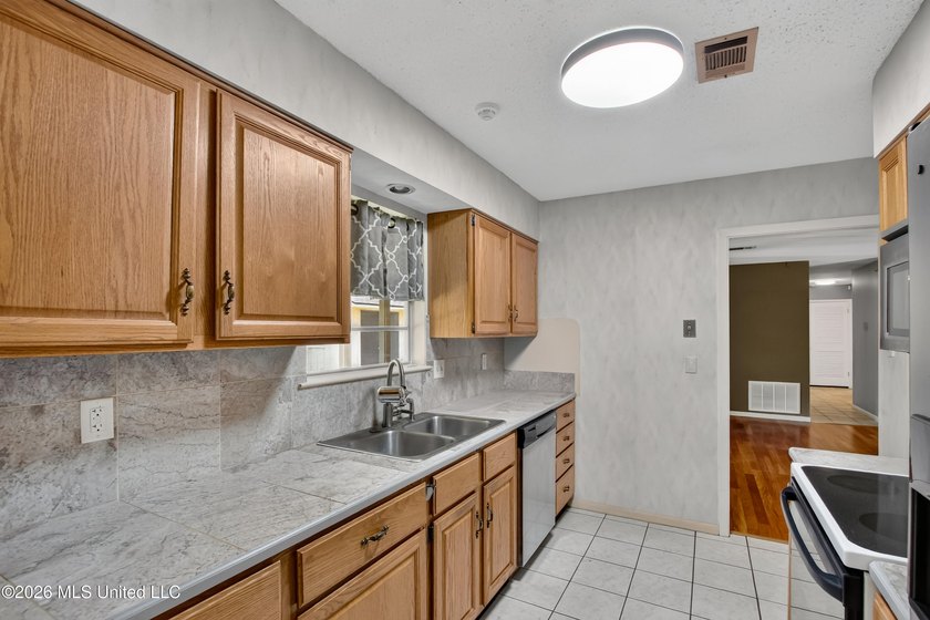 This well kept home is located close to shopping as well as golf - photo 9