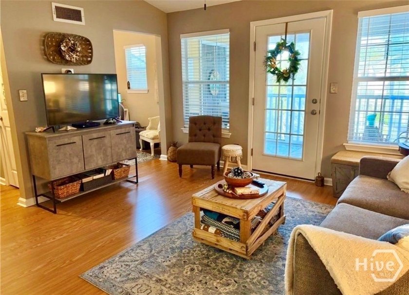 Enjoy coffee on your private patio! This charming 1BR/1BA condo - photo 3