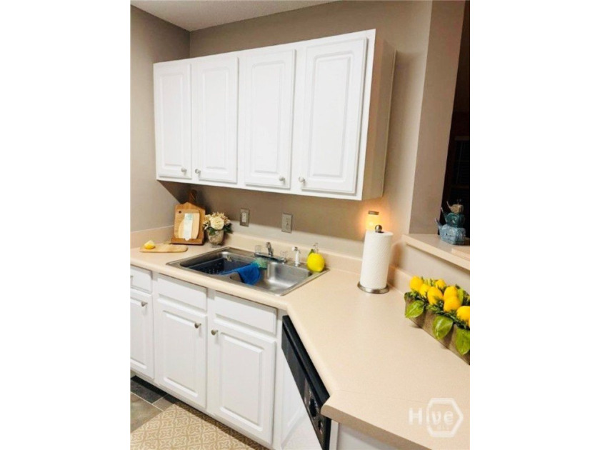 Enjoy coffee on your private patio! This charming 1BR/1BA condo - photo 8