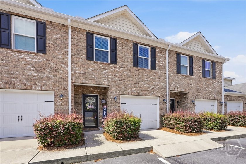 Come see this low-maintenance 2-bedroom townhome conveniently - photo 3