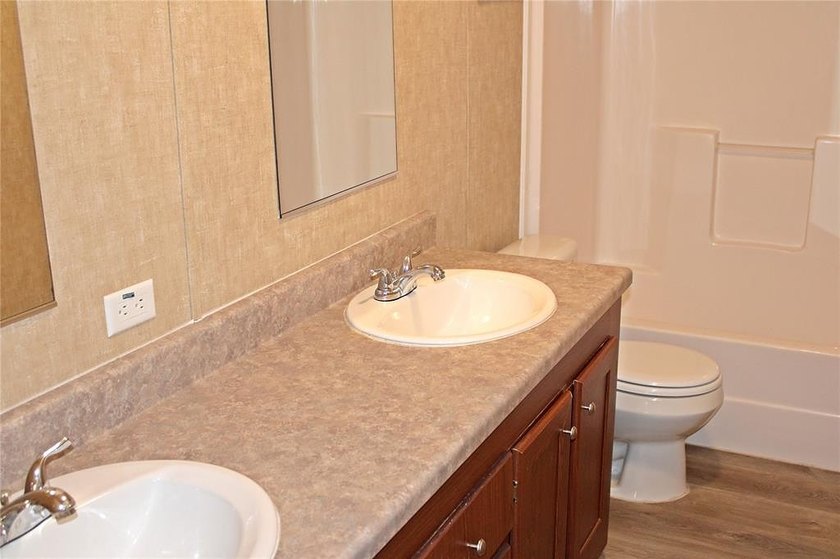 With waterfront community amenities, this move in ready home on - photo 8