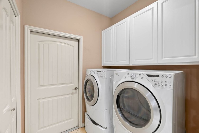 Designed with an attractive open-concept floor plan, the - photo 11