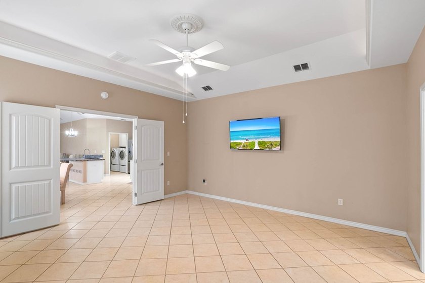 Designed with an attractive open-concept floor plan, the - photo 14