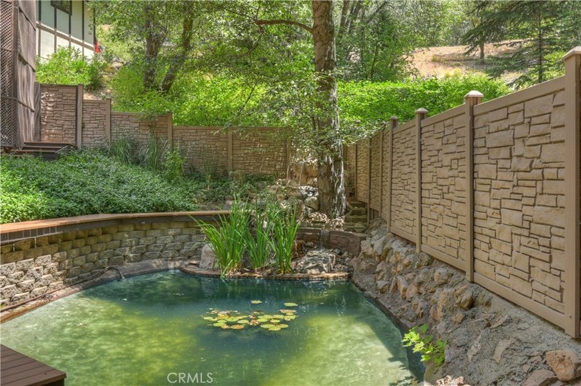 *Forested Oasis on 3 Private Acres*. Discover an extraordinary - photo 4