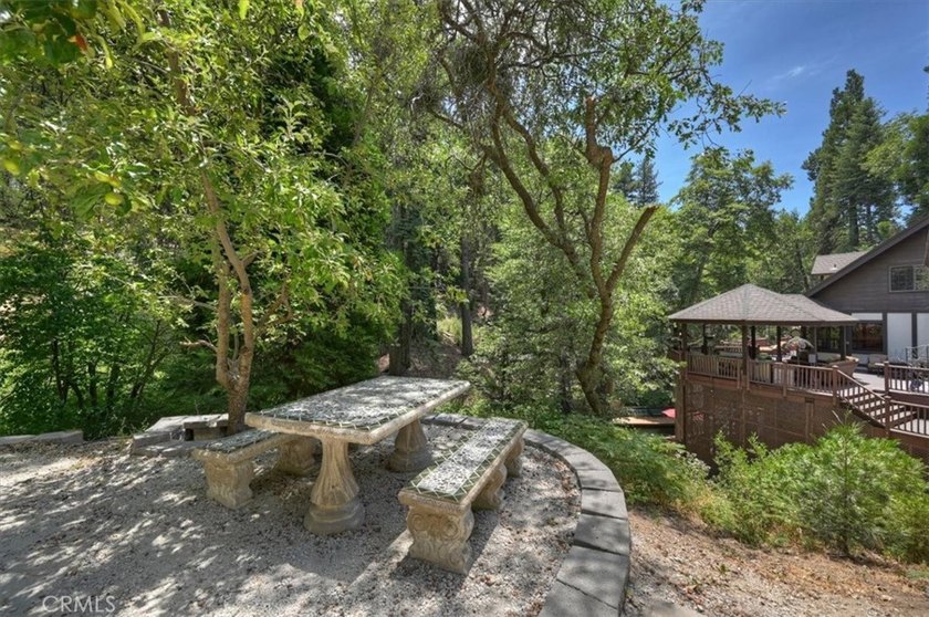 *Forested Oasis on 3 Private Acres*. Discover an extraordinary - photo 9