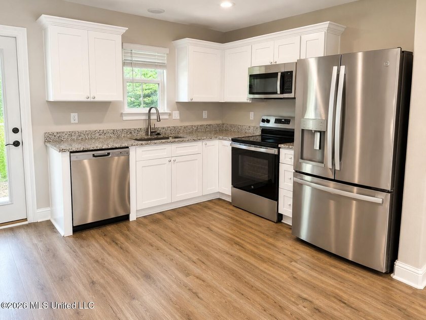Move-in ready 3-bedroom home built in 2024! This well-maintained - photo 4