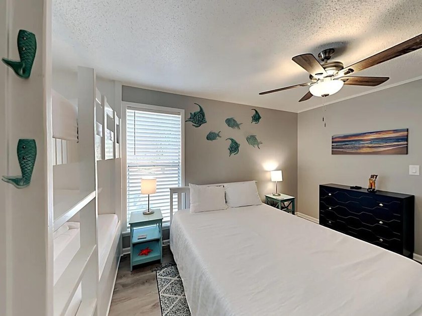 Renovated 1-bedroom condo in a peaceful setting with mature - photo 12