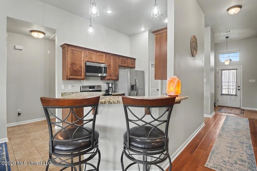 Well-maintained and lovingly cared for, this beautiful home - photo 6