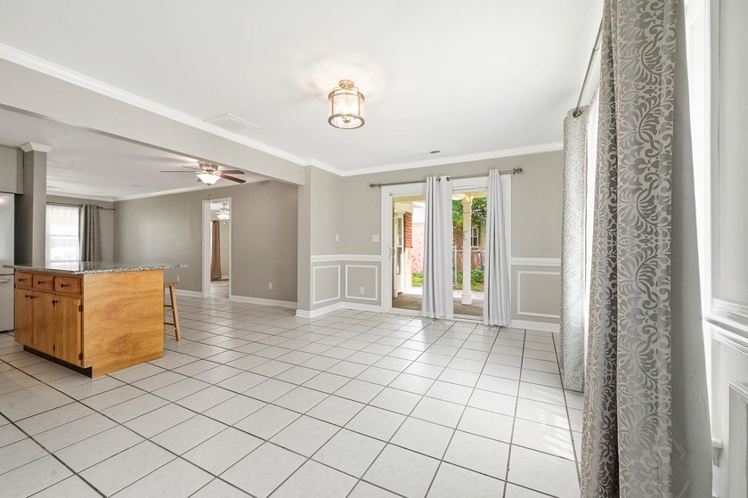 Welcome home to this beautifully updated 3-bedroom, 2-bath brick - photo 11