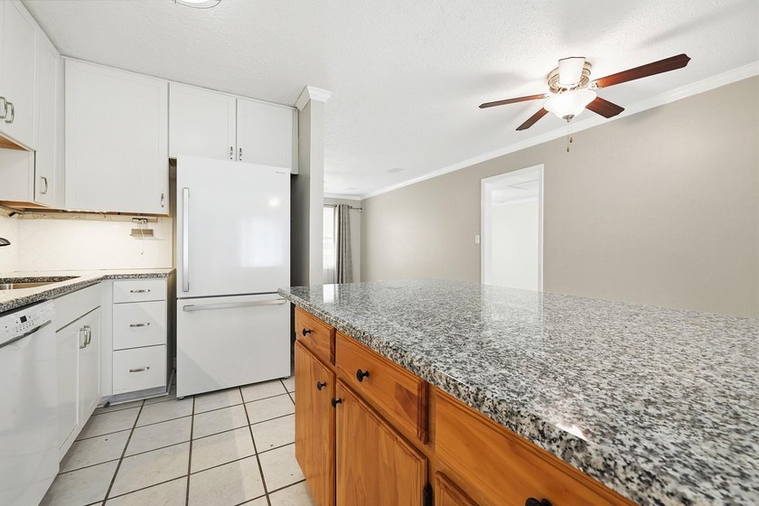 Welcome home to this beautifully updated 3-bedroom, 2-bath brick - photo 13
