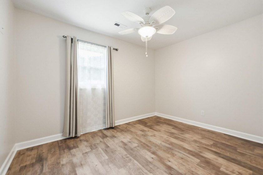 Welcome home to this beautifully updated 3-bedroom, 2-bath brick - photo 23