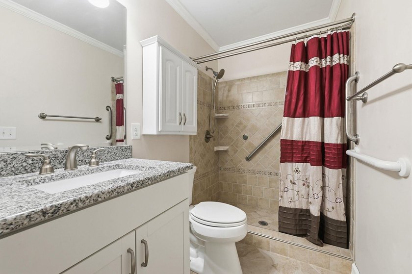 Welcome home to this beautifully updated 3-bedroom, 2-bath brick - photo 27