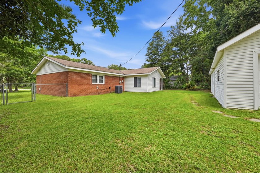 Welcome home to this beautifully updated 3-bedroom, 2-bath brick - photo 31