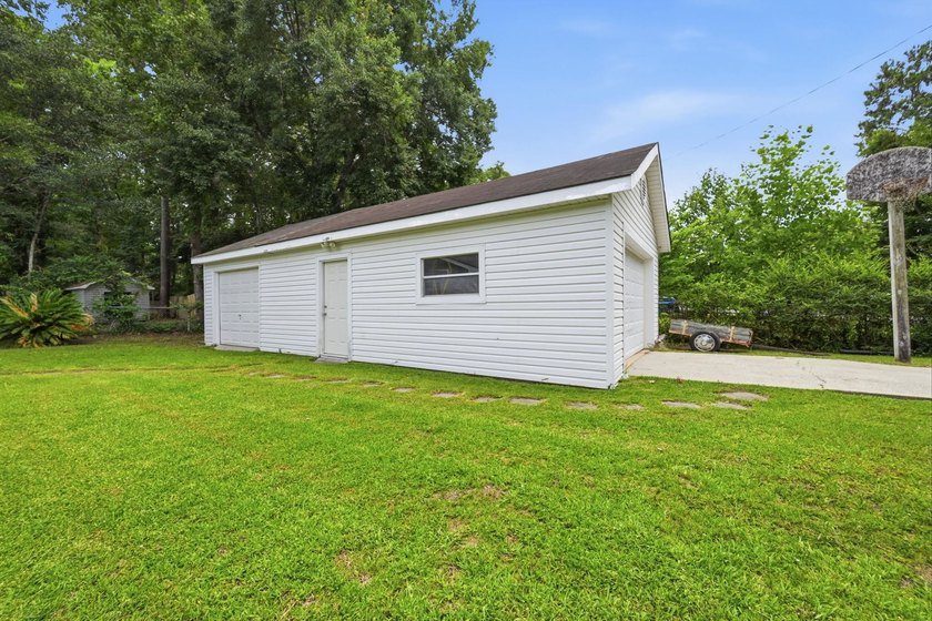 Welcome home to this beautifully updated 3-bedroom, 2-bath brick - photo 36