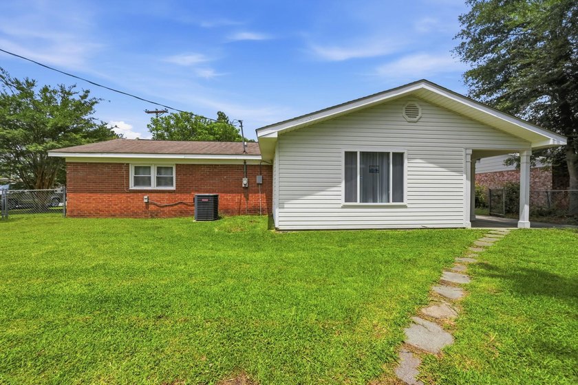Welcome home to this beautifully updated 3-bedroom, 2-bath brick - photo 37