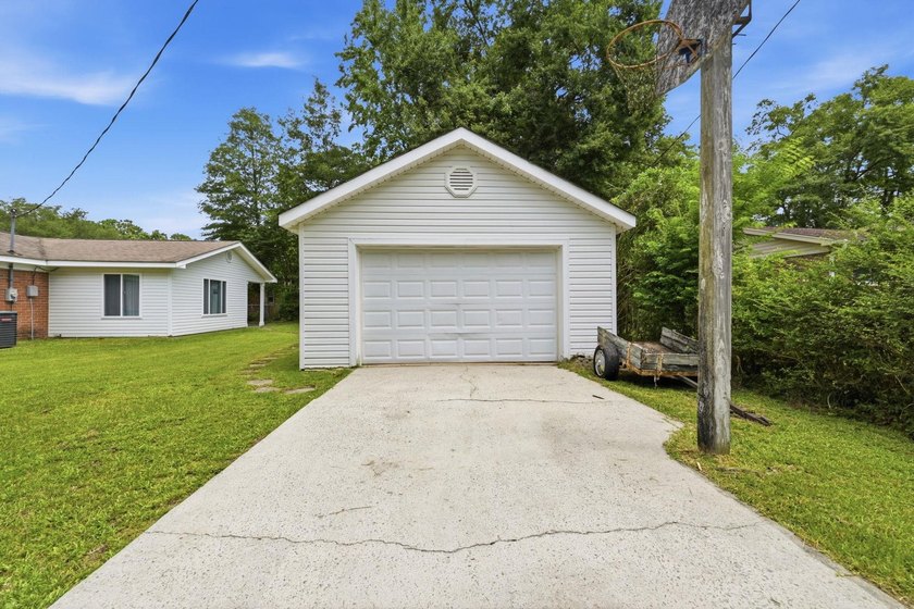 Welcome home to this beautifully updated 3-bedroom, 2-bath brick - photo 38