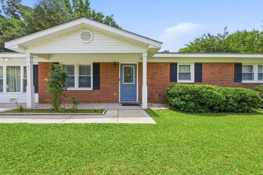 Welcome home to this beautifully updated 3-bedroom, 2-bath brick - photo 39