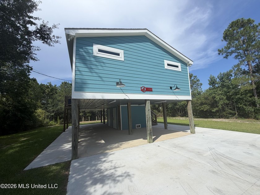 Completely remodeled inside and out, this waterfront coastal - photo 2