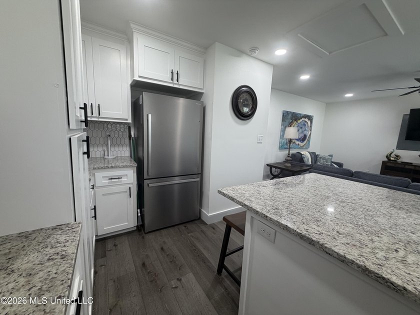 Completely remodeled inside and out, this waterfront coastal - photo 8