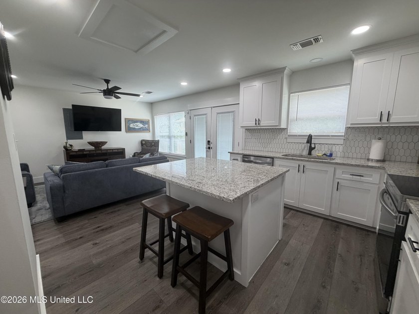 Completely remodeled inside and out, this waterfront coastal - photo 9