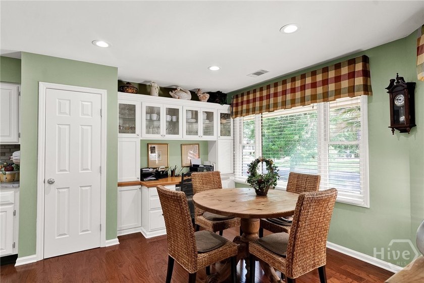 This exceptionally updated, one-level end unit on the lagoon is - photo 10