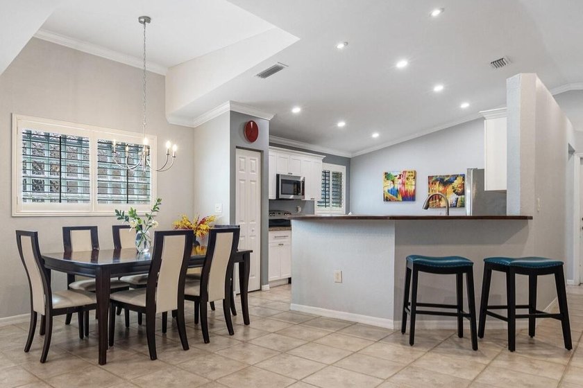 Welcome to this charming residence in the highly desirable gated - photo 13