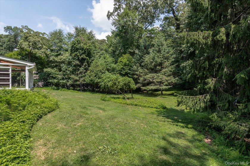 Nestled on a quiet half-acre lot in one of Stony Brook's most - photo 22