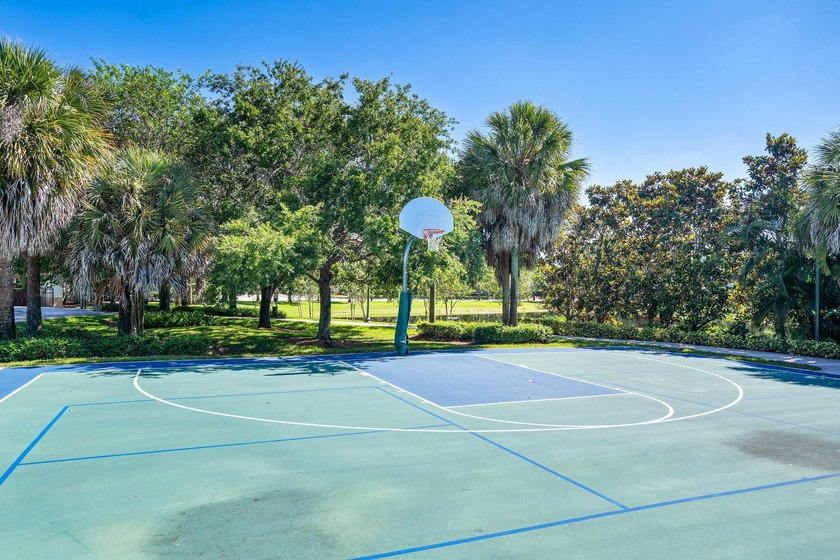 Welcome to this charming residence in the highly desirable gated - photo 25